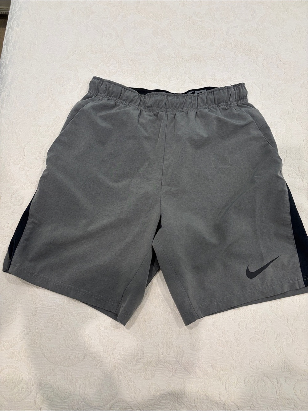 Nike Men's Gray Athletic Shorts with Black Swoosh